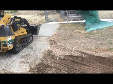 tracked or tired skid steer removing rocks from property|tractorbynet skid steer tracks.